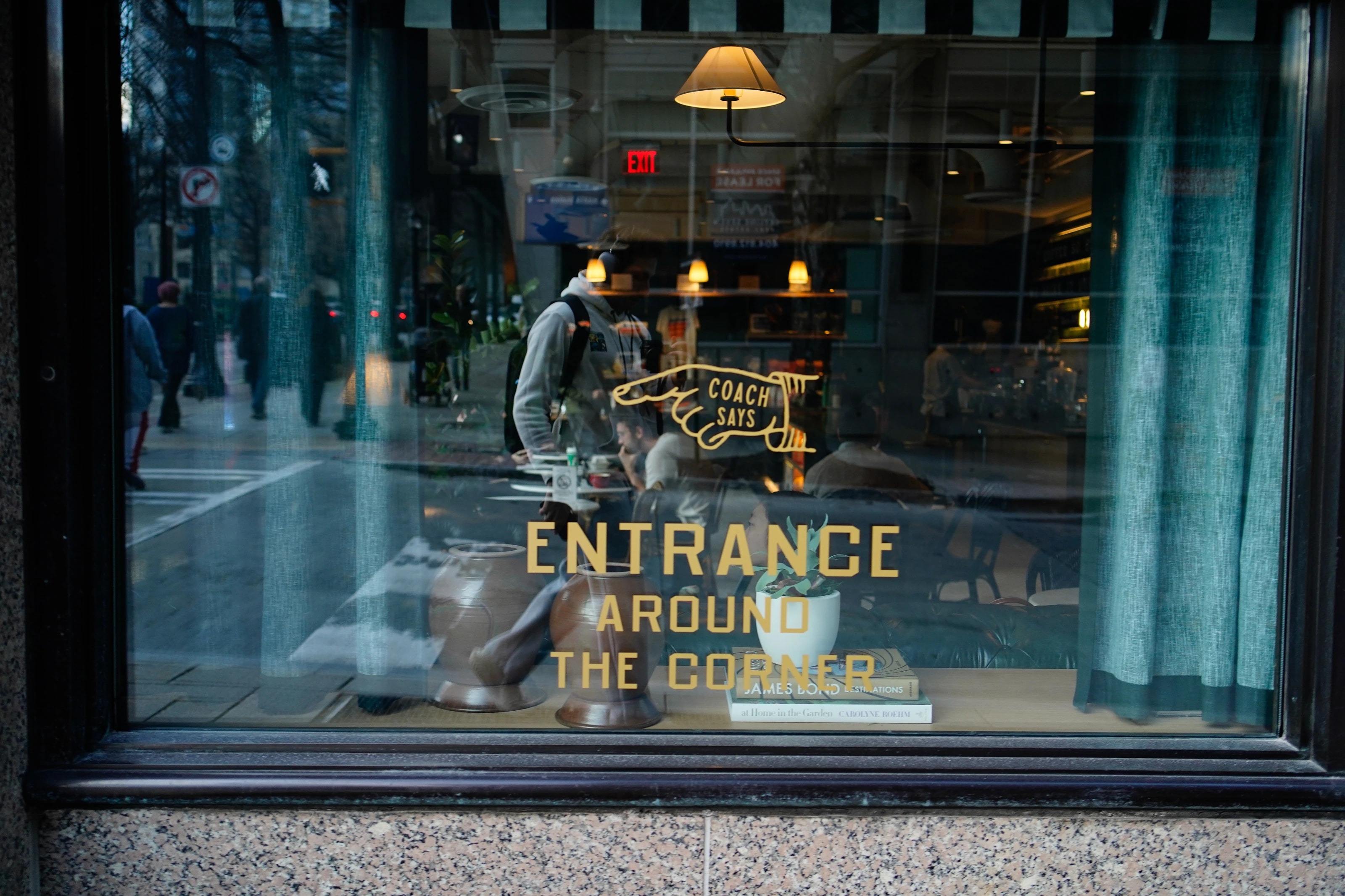 Reflections and signage in a shop window